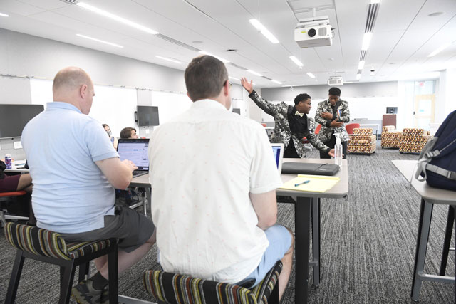 Judges watching 2 students perform Judges watching 2 students perform